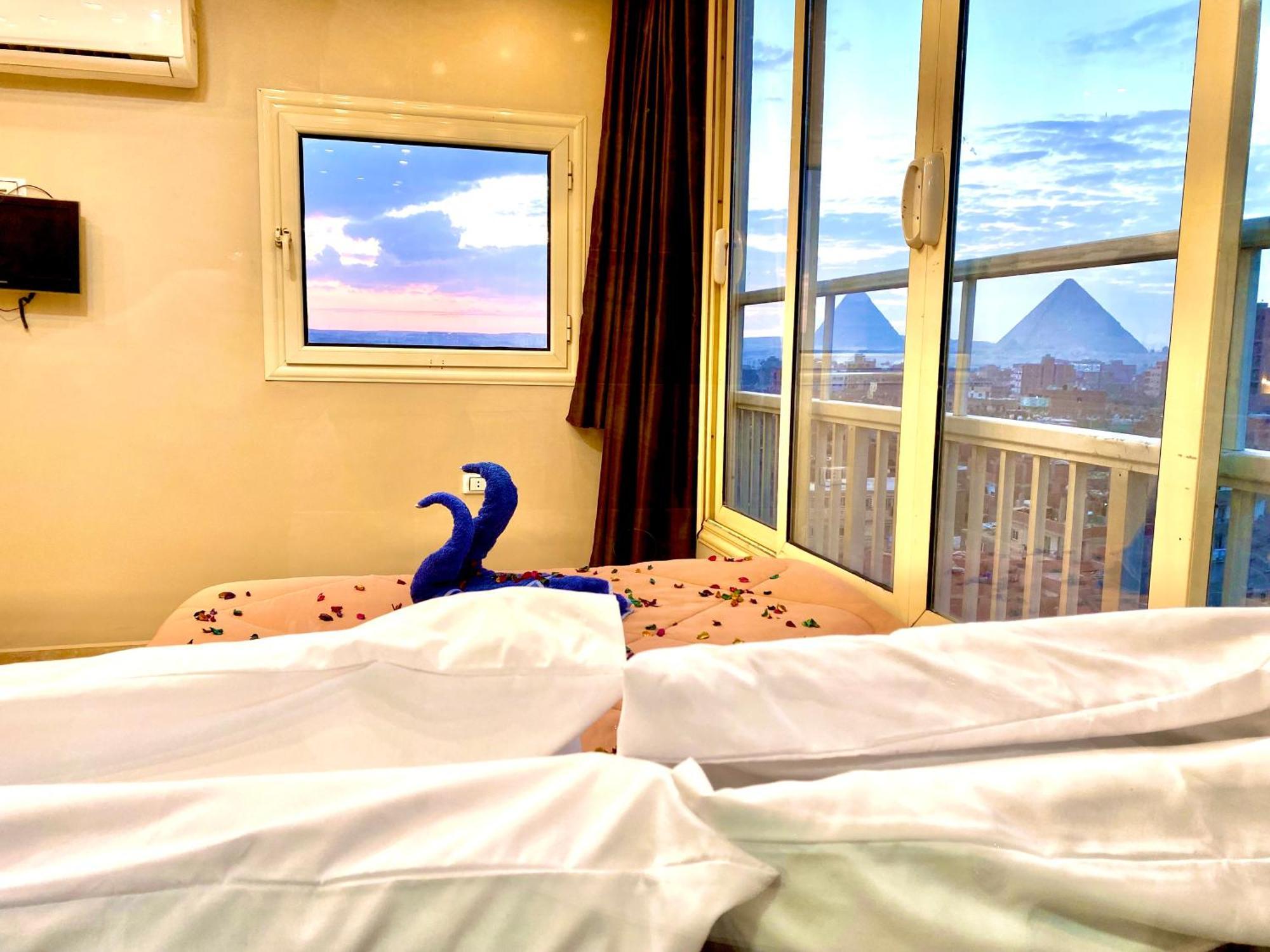 Horus Horizon Inn Pyramids View Kafrat al Jabal Bagian luar foto